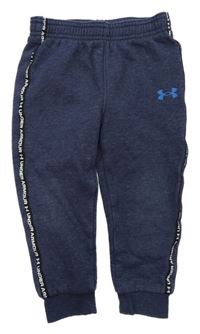 Tmavomodré tepláky s logem Under Armour