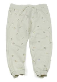 Smetanové tepláky s kytičkami Primark