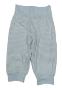 Světlemodro-biele pruhované tepláky