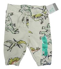 Nové - Smetanové tepláky s dinosaury Primark