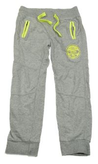 Šedo-neonově žluté tepláky s potiskem Benetton