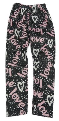 Čierne bodkovaná é športové legíny s nápismi