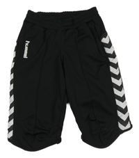 Černo-bílé vzorované sportovní capri tepláky Hummel