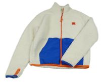 Smetanovo-modrá huňato/šusťáková bunda s nášivkou 