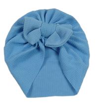 Modrá vzorovaná turbanová čepice s mašlí