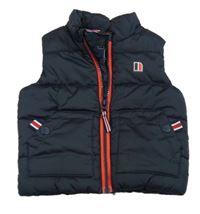 Tmavomodrá šušťáková zateplená vesta s červeným zipsom Next