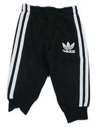 Čierne tepláky s pruhy Adidas