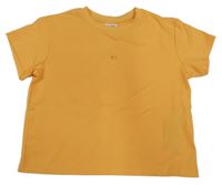 Oranžové rebrované crop tričko so srdiečkovaným prestrihom Y.F.K.