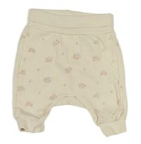 Smetanové baggy tepláky s květy H&M