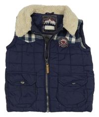 Tmavomodro-kockovaná šušťáková zateplená vesta