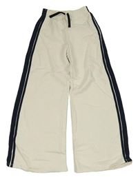 Smetanové široké chino tepláky s pruhy Zara