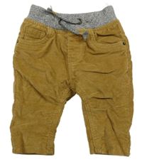 Okrové podšité manšestráky s úpletovým pasem C&A