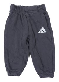 Tmavošedé tepláky s logem Adidas 