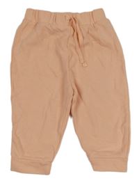 Meruňkové tepláky Next