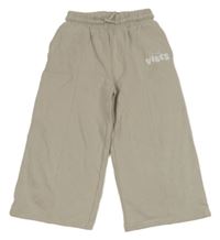 Béžové tepláky s nápisem Next