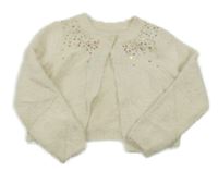 Smetanové chlupaté propínací svetrové bolérko s flitrami C&A