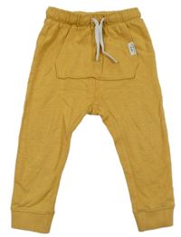 Okrové tepláky H&M