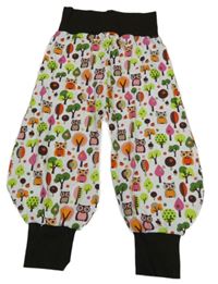 Bílo-hnědo-barevné tepláky se stromy a sovami 