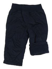 Tmavomodré šusťákové zateplené kalhoty s úpletovým pasem Topomini