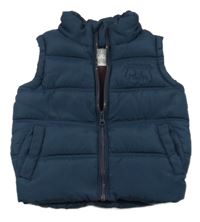 Tmavomodrá šusťáková zateplená vesta s výšivkou Rebel