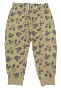 Béžové tepláky s Mickeym George 