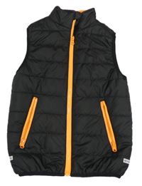 Čierno-oranžová šušťáková prešívaná zateplená vesta