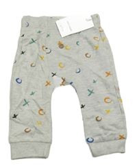 Nové - šedé tepláky s barevným vzorem dunnes 