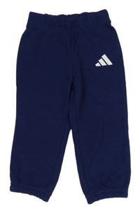 Tmavomodré tepláky s logem Adidas