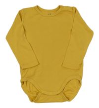 Hořčicové body H&M