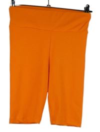 Dámske oranžové elastické kraťasy