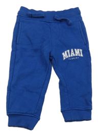 Safírové tepláky s nápisy PIAZZAITALIA