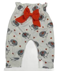 Biele ľahké tepláky s ježkami a mašlou