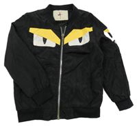 Černá šusťáková jarní bunda s očima 