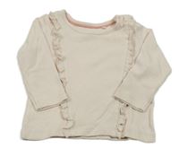 Světlepudrové triko s volánky lupilu