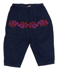 Tmavomodré široké rifle s květy 