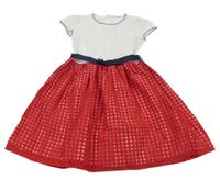 Bílo-tmavomodré puntíkaté šaty s červenou sukní 