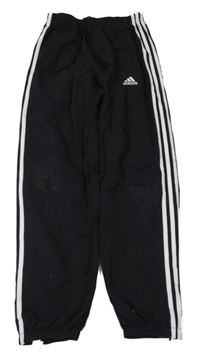 Čierne šušťákové podšité nohavice s logom Adidas