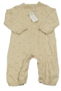 Nové - světlebéžový 3D puntíkatý pletený overal DOLLY WEARS