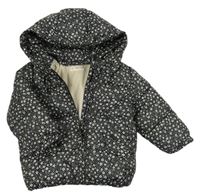 Černá puntíkatá šusťáková zimní bunda s květy a kapucí Mango