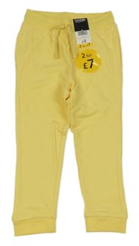 Nové - Žluté tepláky George 