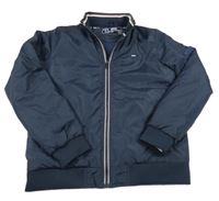 Tmavomodrá šusťáková zateplená bunda Diesel