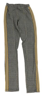 Černo-okrové kostičkované tregíny s pruhem 