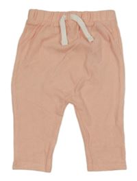 Svetloružové úpletové tepláky Tu