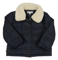 Tmavomodrá šusťáková prošívaná zateplená bunda Tommy Hilfiger 