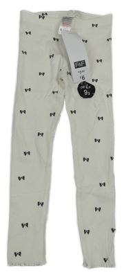 Nové - smetanové žebrované legíny s mašličkami F&F