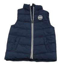 Tmavomodrá šušťáková zateplená vesta s nášivkou Dopodopo