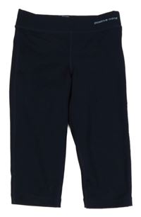 Tmavomodré capri športové legíny s nápisom TCM