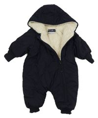 Tmavomodrá prošívaná šusťáková zimní kombinéza s kapucí KIABI