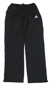 Černé šusťákové kalhoty s logem Adidas