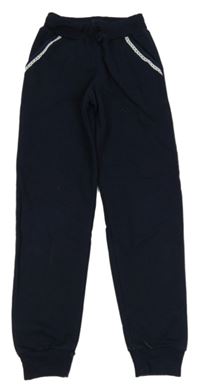 Tmavomodré tepláky s krajkovými volánky